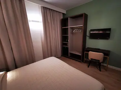 Letto o letti in una camera di Hotel Balcony