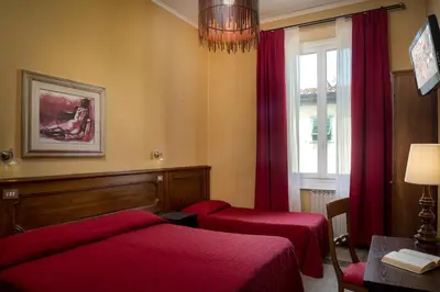 Letto o letti in una camera di Hotel Kursaal & Ausonia