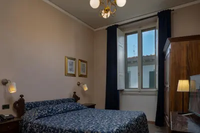 Letto o letti in una camera di Hotel Kursaal & Ausonia