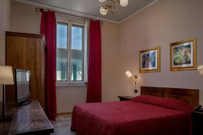 Letto o letti in una camera di Hotel Kursaal & Ausonia