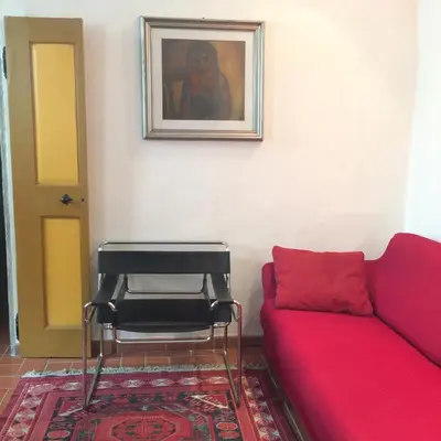 Area soggiorno di Romantico appartamento a 10 minuti a piedi Ponte Vecchio e 5 minuti da Palazzo Pitti , ideale per coppie e famiglie, in area UNESCO