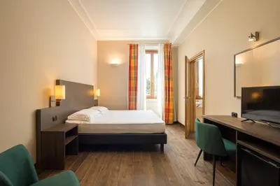Letto o letti in una camera di Hotel Villa Betania