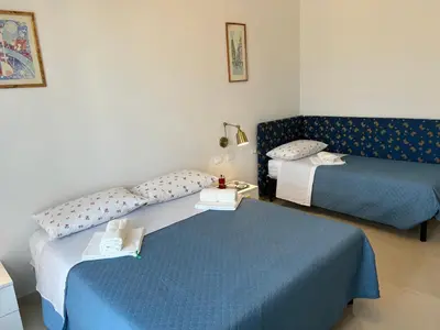 Letto o letti in una camera di Dario's House 2