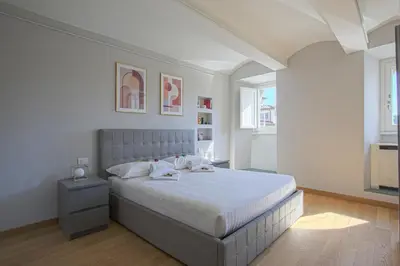 Letto o letti in una camera di Luxury Suite in Florence