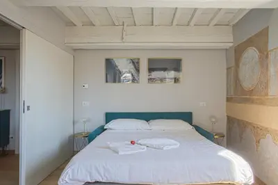 Letto o letti in una camera di Luxury Suite in Florence