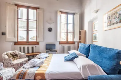 Area soggiorno di Lovely Loft 2 steps from the Cathedral in Florence