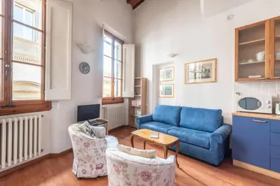 Area soggiorno di Lovely Loft 2 steps from the Cathedral in Florence