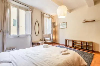 Letto o letti in una camera di GuestHost - Mercato di Sant'Ambrogio Cozy Apartment