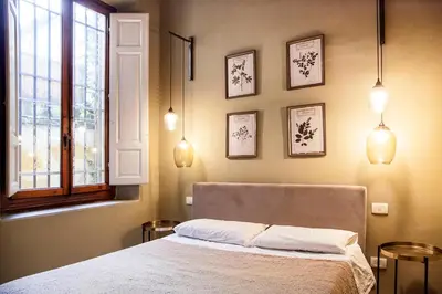 Letto o letti in una camera di La Casa di Rouse
