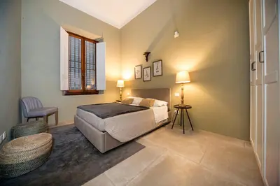 Letto o letti in una camera di La Casa di Rouse