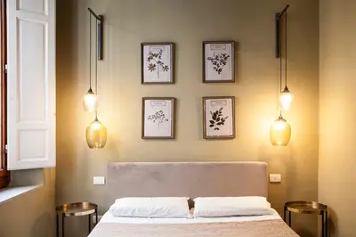 Letto o letti in una camera di La Casa di Rouse