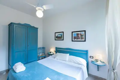 Letto o letti in una camera di Ponte Vecchio - Appartamenti Borgo San Jacopo