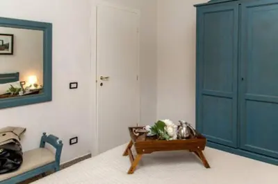 Letto o letti in una camera di Ponte Vecchio - Appartamenti Borgo San Jacopo