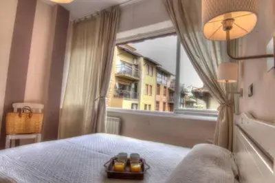Letto o letti in una camera di Ponte Vecchio - Appartamenti Borgo San Jacopo