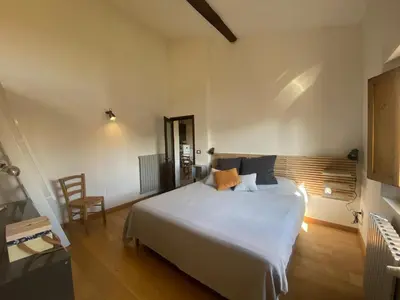 Letto o letti in una camera di Giglio Apartment by Mamo Florence