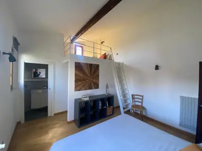 Letto o letti in una camera di Giglio Apartment by Mamo Florence