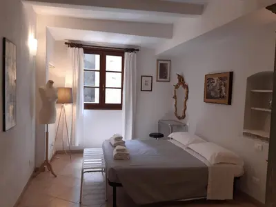 Letto o letti in una camera di casa de blu