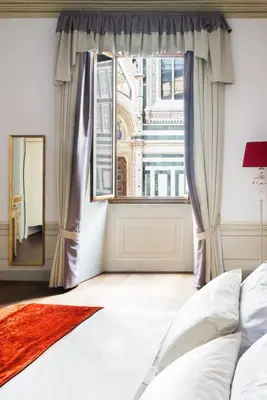 Letto o letti in una camera di Firenze al Duomo