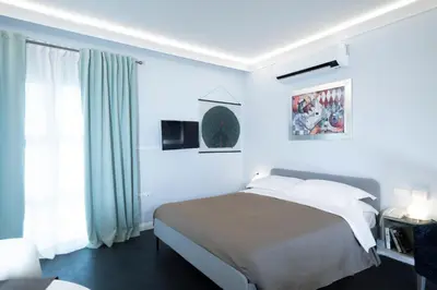 Letto o letti in una camera di Quadra Key Easy Home In Florence