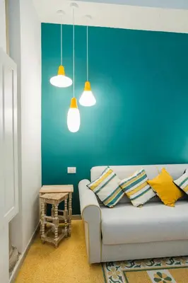 Letto o letti in una camera di Sant'Ambrogio - Appartamento City Turquoise