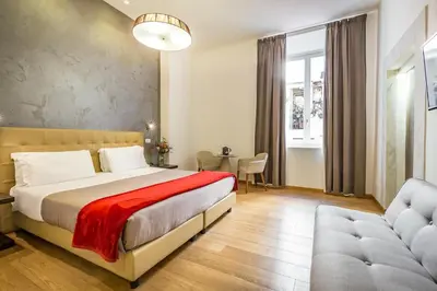 Letto o letti in una camera di Hotel La Scaletta al Ponte Vecchio