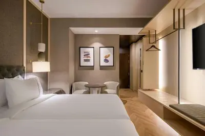 Letto o letti in una camera di AC Hotel Firenze by Marriott