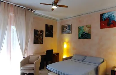 Letto o letti in una camera di Casa di Giada appartamento luminoso a due passi dalla tramvia per Firenze