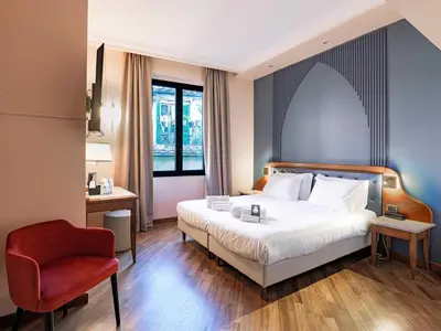 Letto o letti in una camera di B&B Hotel Firenze Laurus Al Duomo