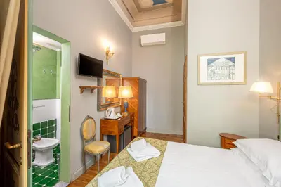 Letto o letti in una camera di Il Marzocco Boutique B&B