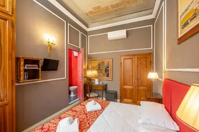 Letto o letti in una camera di Il Marzocco Boutique B&B
