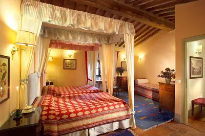 Letto o letti in una camera di Villa Il Poggiale Dimora Storica