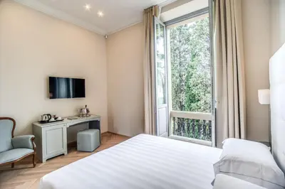 Letto o letti in una camera di Hotel Ariele