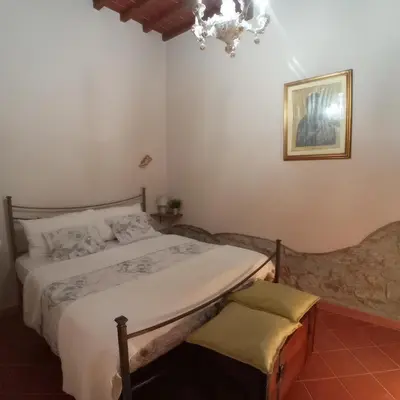 Letto o letti in una camera di LA GUELFA 64