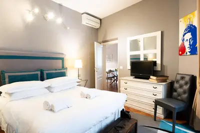 Letto o letti in una camera di Duomo SMN - Appartamento Sandrose
