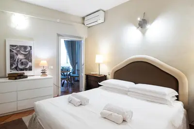 Letto o letti in una camera di Duomo SMN - Appartamento Sandrose