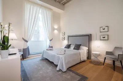 Letto o letti in una camera di Brunelleschi Suite