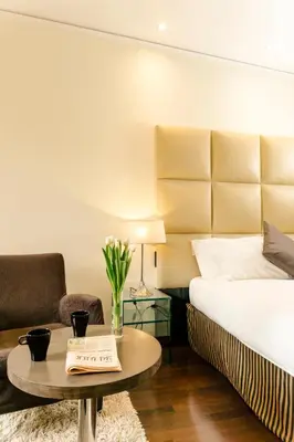 Letto o letti in una camera di Cosmopolitan Hotel