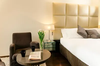 Letto o letti in una camera di Cosmopolitan Hotel