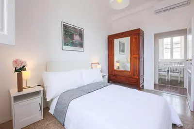 Letto o letti in una camera di Apartments Florence - Florentine Skyline