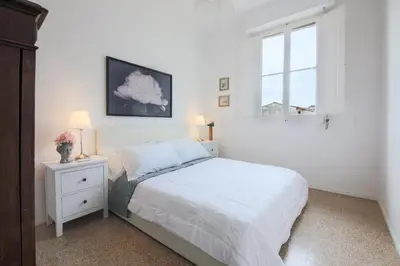 Letto o letti in una camera di Apartments Florence - Florentine Skyline