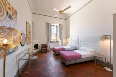 Letto o letti in una camera di Borgo Santa Croce