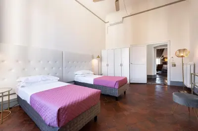 Letto o letti in una camera di Borgo Santa Croce