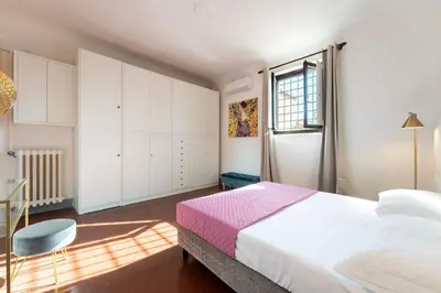Letto o letti in una camera di Borgo Santa Croce