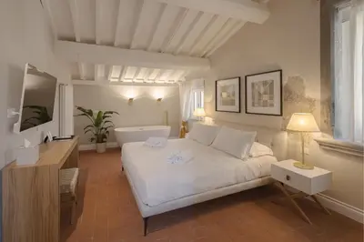 Letto o letti in una camera di Relais Condotta
