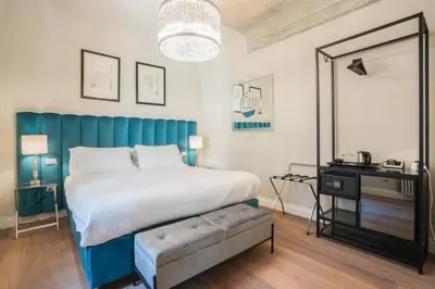 Letto o letti in una camera di Relais Condotta