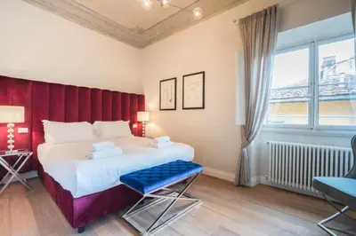 Letto o letti in una camera di Relais Condotta