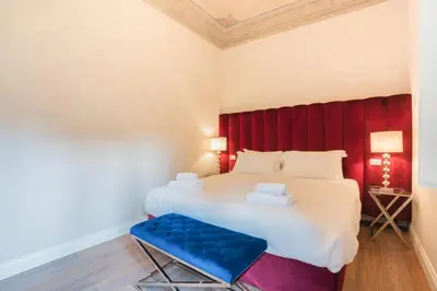 Letto o letti in una camera di Relais Condotta