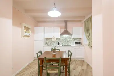 Cucina o angolo cottura di Residenza dei Piaceri Perduti-Rosa