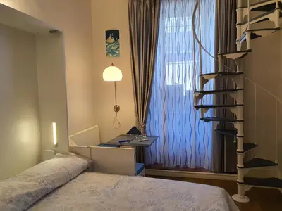 Letto o letti in una camera di RF Duomo suites