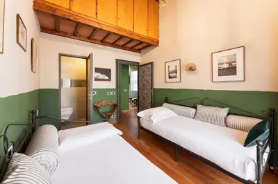 Letto o letti in una camera di Firenze Rentals Corso 12